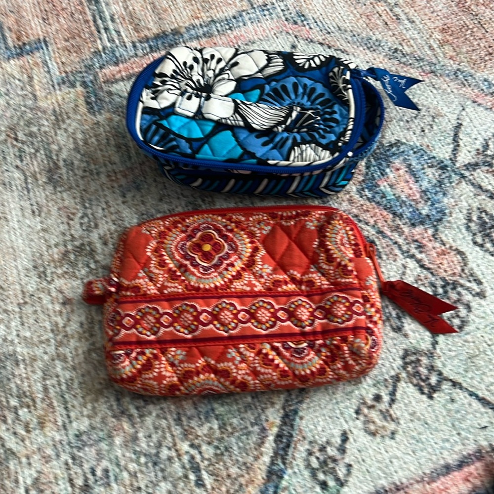 2 Vera Bradley small wallets. Great condition
